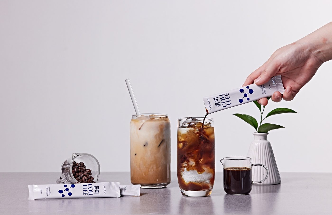 A stick poured into iced coffee